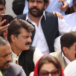 Dr Shahzad Waseem in a protest by PTI 