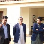 Dr Shahzad Waseem in discussion with other party leaders at Bani Gala Islamabad